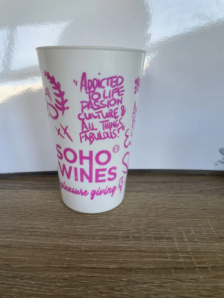 Cup printed in pink with Soho Wines lettering