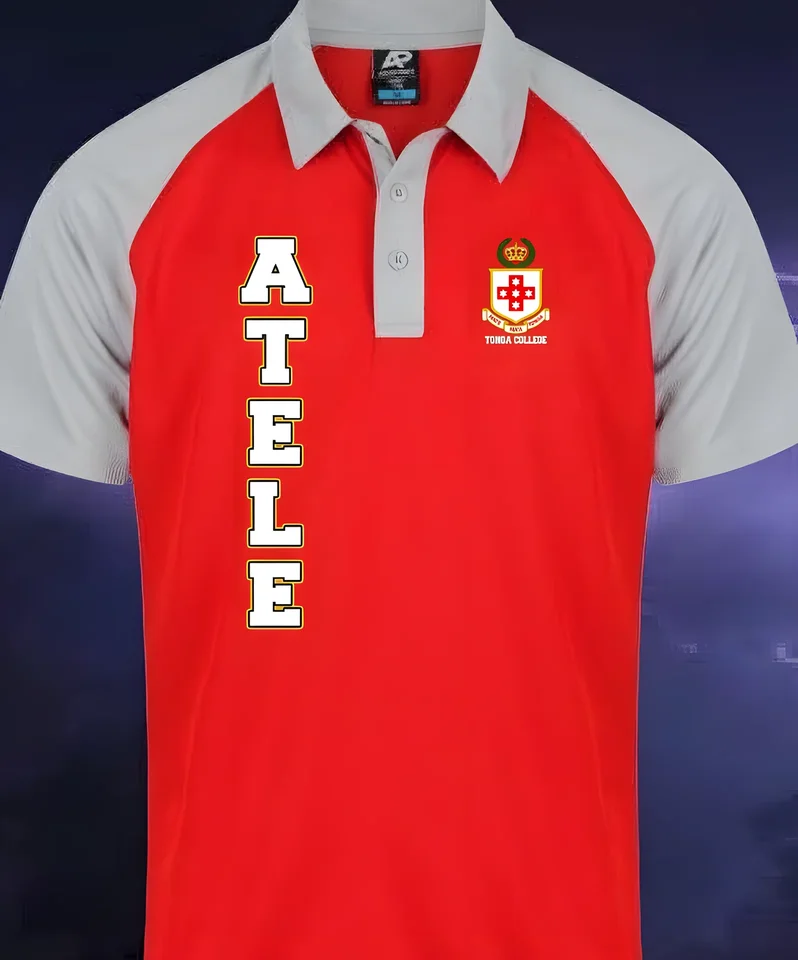 Red and grey polo with ʻAtele printed down the front