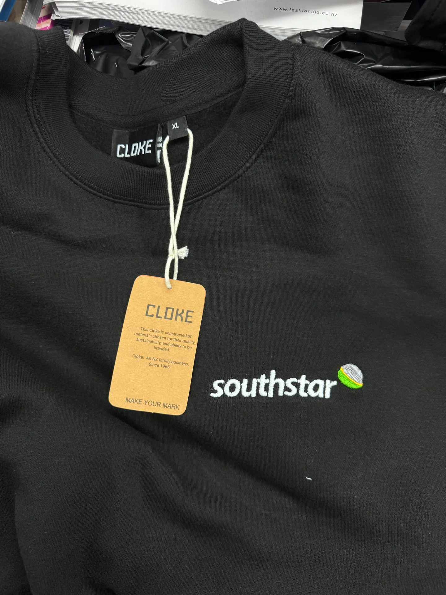Southstar logo printed on a black Cloke sweatshirt
